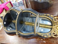 A VICTORIAN FRENCH STYLE THREE TIER MIRRORED BACK CORNER SHELF WITH EBONISED MOULDED FRAME AND