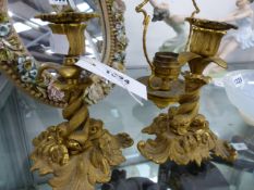 A PAIR OF ORMOLU ENTWINED DOLPHIN FORM SINGLE CANDLESTICKS. H.16cms.