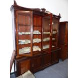 A LARGE VICTORIAN MAHOGANY GLAZED BOOKCASE BY LAMB F MANCHESTER.