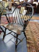 A SET OF EIGHT AMERICAN CONTINUOUS ARM COMB BACK WINDSOR CHAIRS WITH SADDLE SEATS.