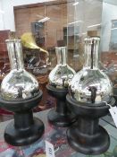 A GROUP OF THREE RARE SCIENTIFIC ACID JARS, EACH ON A TURNED WOOD STAND.