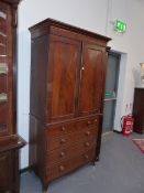 A LATE GEORGIAN MAHOGANY LINEN PRESS OF SMALL PROPORTIONS. W.99 x H.208cms.