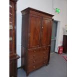 A LATE GEORGIAN MAHOGANY LINEN PRESS OF SMALL PROPORTIONS. W.99 x H.208cms.