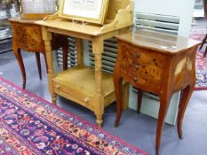 A PAIR OF CONTINENTAL PARQUETRY INLAID THREE DRAWER SMALL CHESTS ON SHAPED LEGS WITH BRASS FEET.