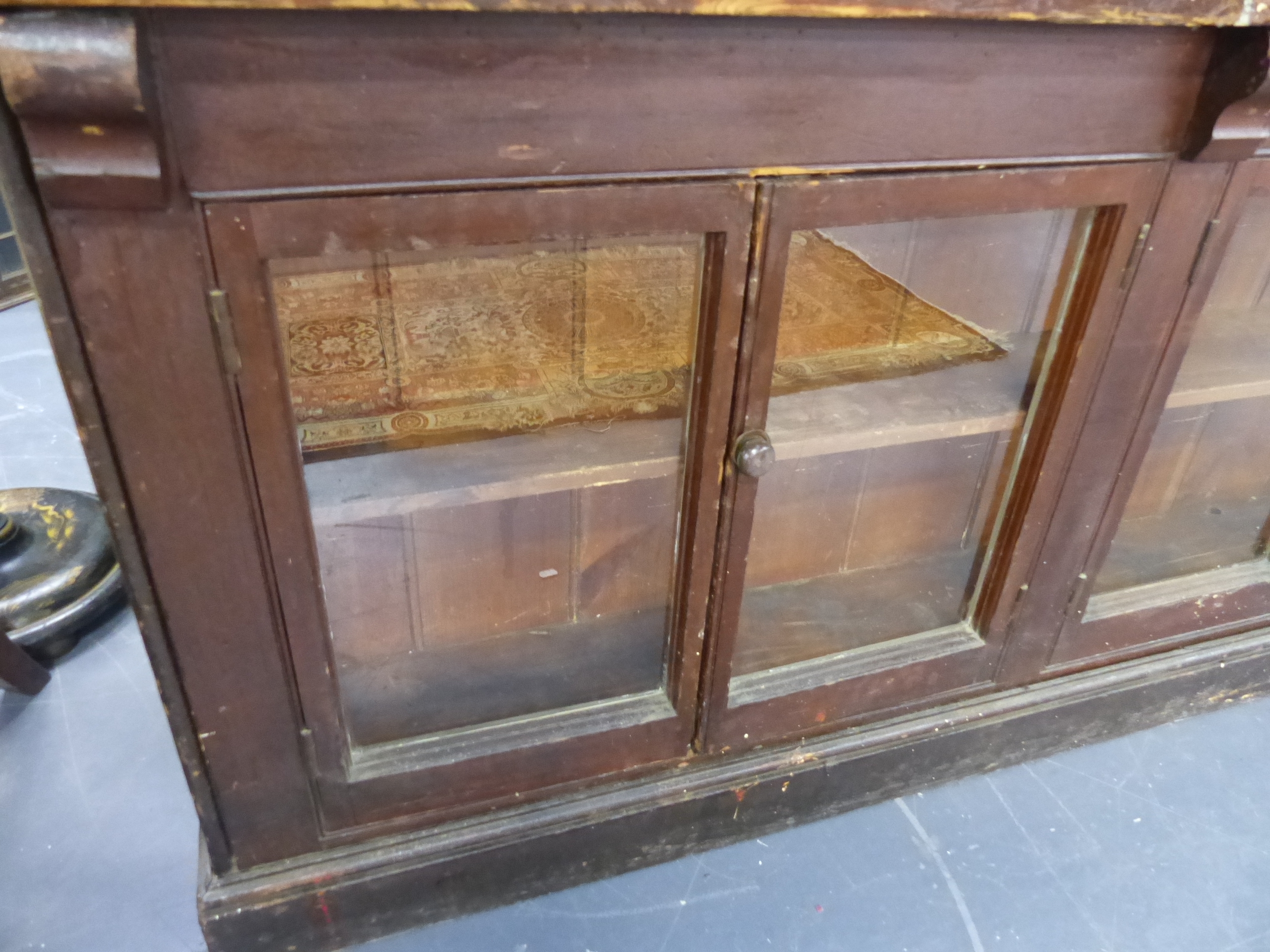 AN ANTIQUE PINE SHOP COUNTER WITH SIX GLAZED PANEL DOORS ENCLOSING SHELVES. W.244 x D.68 x H.83cms. - Image 4 of 16