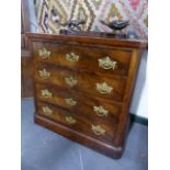 A SMALL FRENCH FLAME MAHOGANY CHEST OF FOUR LONG DRAWERS. W.75 x H.73cms.