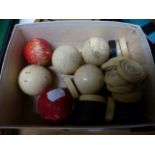A GROUP OF SIX ANTIQUE IVIORY SNOOKER BALLS, VARIOUS DRAUGHTS PIECES, AN EARLY TRIBAL AFRICAN IVORY