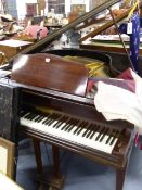 A GOOD QUALITY BABY GRAND PIANO BY MONINGTON. W.137 x L.140.