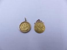 A HALF SOVEREIGN COIN IN A SCROLL TOP SOLDERED MOUNT DATED 1918 TOGETHER WITH A FURTHER MOUNTED HALF