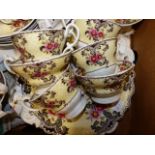 A VICTORIAN POTTERY PART TEA SET WITH FLORAL DECORATION TO INCLUDE CUPS AND SAUCERS, SIDE PLATES,