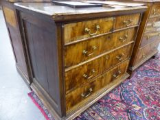 A 17th/18th.C. OAK AND WALNUT CHEST OF TWO SHORT AND THREE LONG DRAWERS STANDING ON LATER BUN