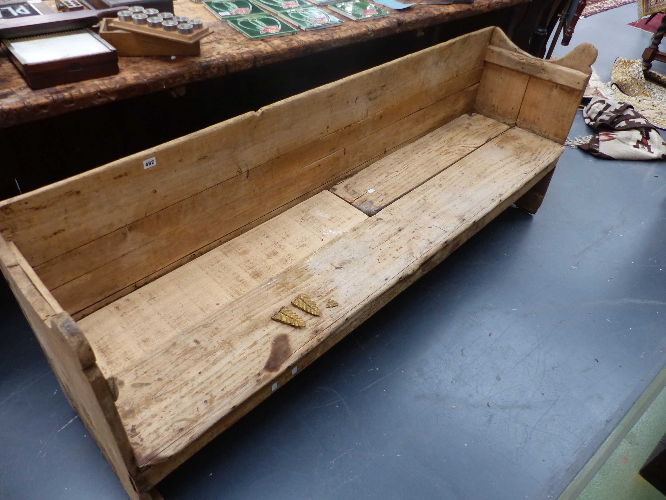 AN ANTIQUE PINE RUSTIC HALL BENCH WITH SHAPED ARMS. W.198cms. - Image 4 of 21