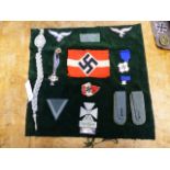 A COLLECTION OF GERMAN NAZI PERIOD MILITARY BADGES, ARMS BANDS, MEDALS ETC TOGETHER WITH A WWII