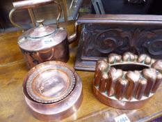 TWO 19th.C.COPPER JELLY MOULDS, A VICTORIAN COPPER KETTLE AND TWO SMALL HAMMERED COPPER DISHES.