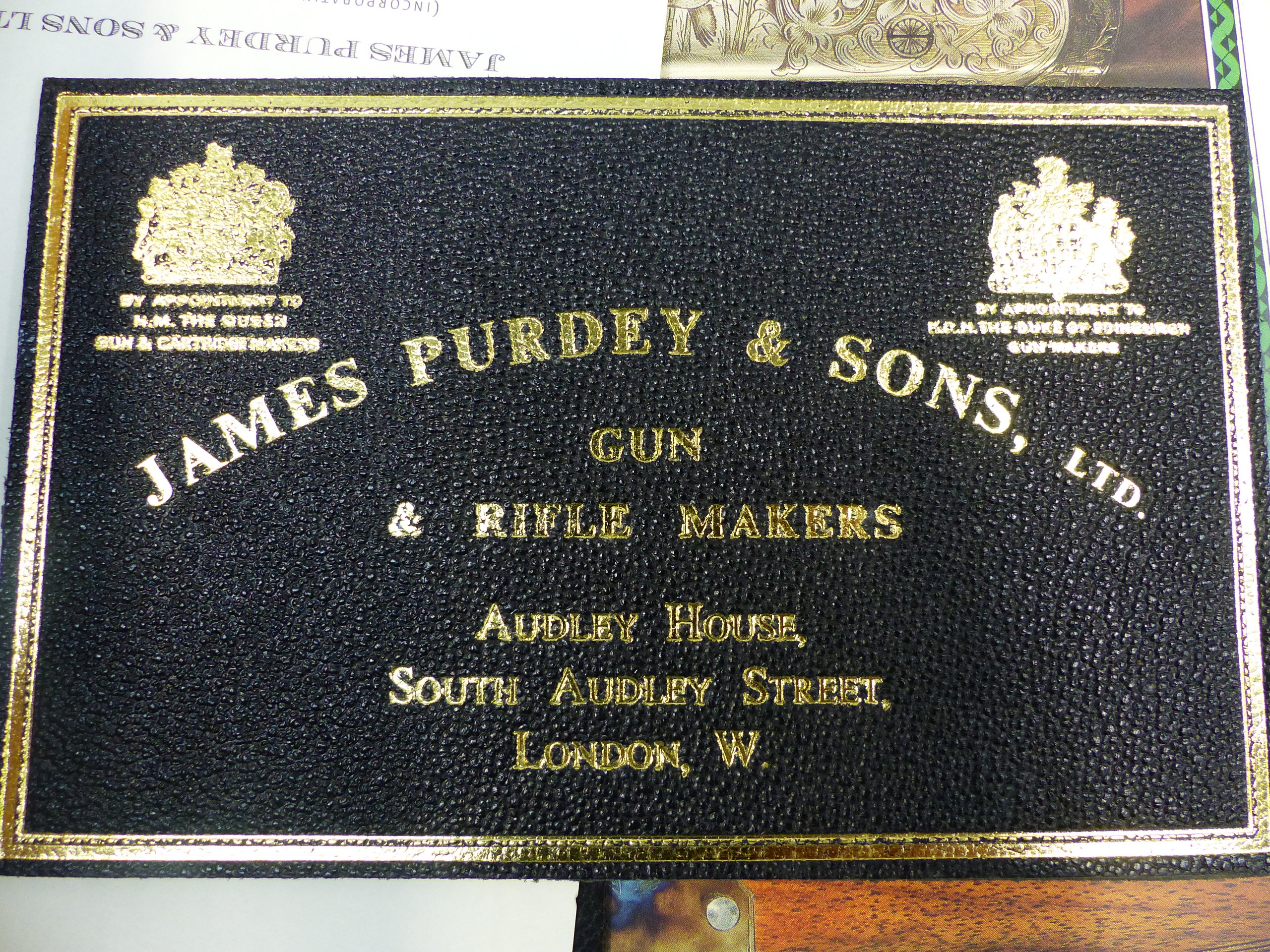 TWO UNUSED JAMES PURDEY AND SONS LEATHER GUN CASE LABELS, A SET OF PURDEY PLACE MARKER CARDS AND A