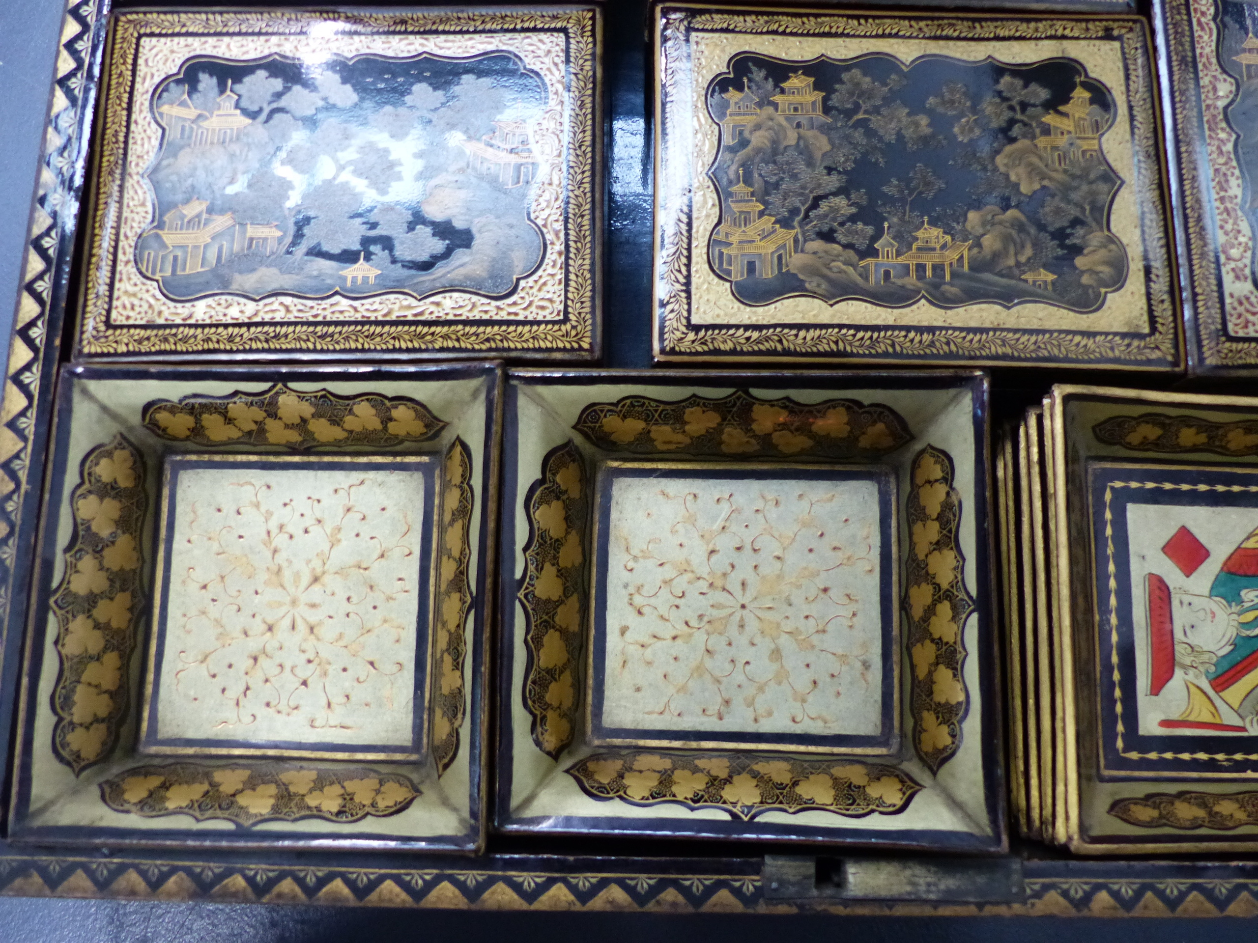 AN UNUSUALLY COMPLETE CHINESE EXPORT BLACK LACQUER GAMES BOX WITH INTERIOR TRAYS AND COVERED - Image 5 of 28