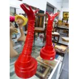 A PAIR OF CONTEMPORARY HAND FORM DISPLAY STANDS.
