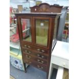 AN EDWARDIAN MAHOGANY MUSIC CABINET.