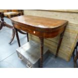 A REGENCY MAHOGANY AND ROSEWOOD CARD TABLE.