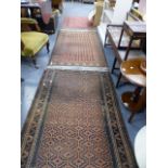 THREE ANTIQUE EASTERN RUGS.