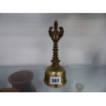 AN EASTERN BRASS PRAYER BELL.