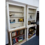 A PAIR OF PAINTED OAK BOOKCASES.