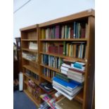 A PAIR OF LARGE BOOKCASES.