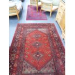 TWO PERSIAN PATTERN RUGS.