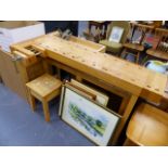 A WOODWORKING TOOL BENCH.