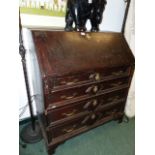 A GEORGIAN OAK BUREAU.