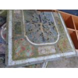 AN INLAID SLATE AND MARBLE TABLE TOP.