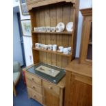 AN ANTIQUE PINE SMALL DRESSER.