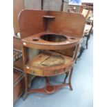 A REGENCY CORNER WASHSTAND.