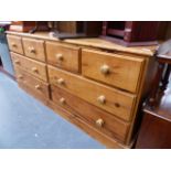 A LARGE PINE MULTI DRAWER CHEST.