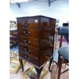 A SMALL MAHOGANY FOUR DRAWER MUSIC CHEST.