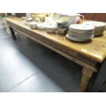 A VERY LARGE HARDWOOD COFFEE TABLE.