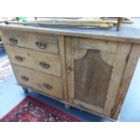 AN ANTIQUE PINE SMALL DRESSER.