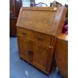 AN ART DECO OAK SMALL BUREAU.