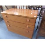 A MODERN THREE DRAWER BEDROOM CHEST.