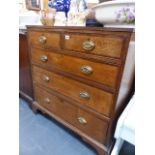 A GEORGIAN OAK AND CROSSBANDED CHEST OF DRAWERS.