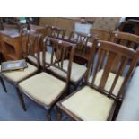 A SET OF FOUR DINING CHAIRS AND TWO OAK CHAIRS.