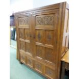 A 19th.C.CARVED OAK HALL CUPBOARD.