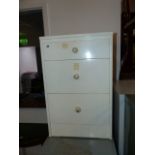 A PAINTED BEDSIDE CABINET.