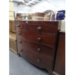 A LATE GEORGIAN MAHOGANY BOW FRONT CHEST OF DRAWERS.