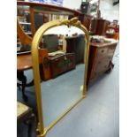 A GILT FRAMED OVERMANTLE MIRROR.