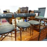 A SET OF FOUR RETRO TEAK CHAIRS.