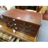 A MAHOGANY NEST OF DRAWERS.