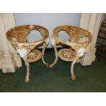 A PAIR OF ANTIQUE CAST IRON PUB TABLE BASES.