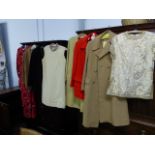 A QTY OF VINTAGE MID CENTURY LADIES DRESSES AND OVERCOATS.