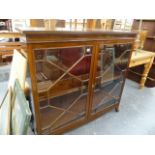 A GOOD QUALITY MAHOGANY GLAZED BOOKCASE.